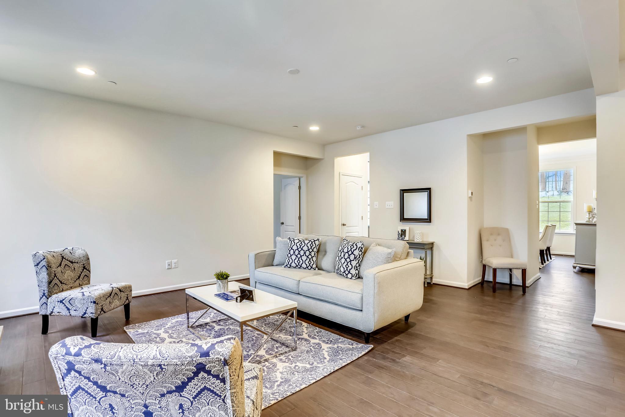 3916 Diplomat Avenue Bowie, MD 20721 - Photo 7 of 18 a living room with furniture and wooden floor