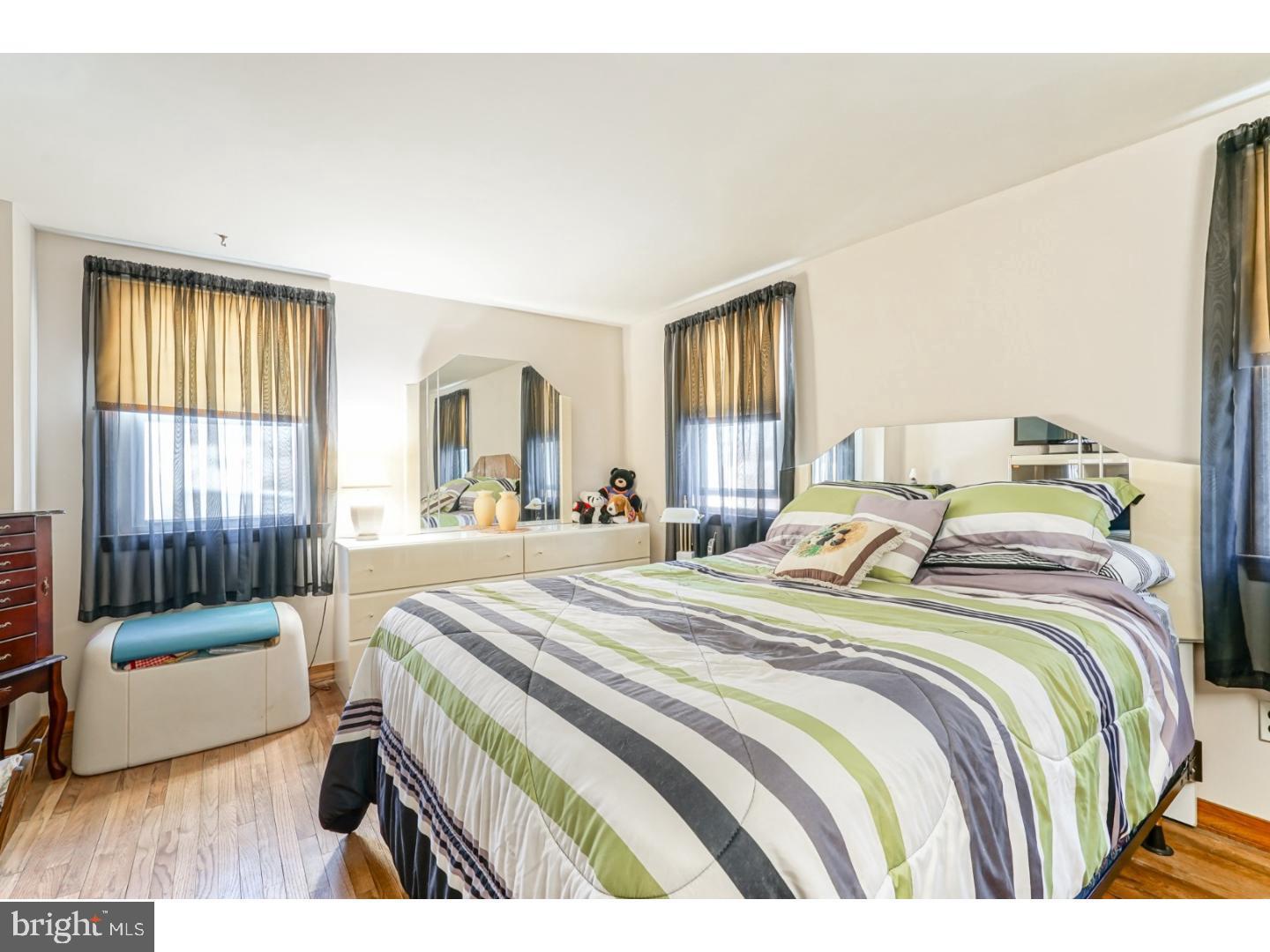 9 Deptford Road Glassboro, NJ 08028 - Photo 11 of 20 a bedroom with a bed and a large window