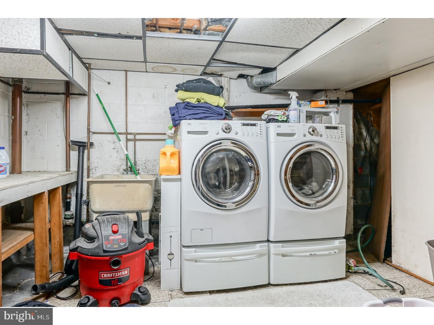 9 Deptford Road Glassboro, NJ 08028 - Photo 20 of 20 a utility room with dryer washer and other items