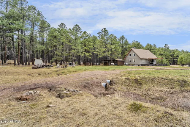 a view of house with outdoor space