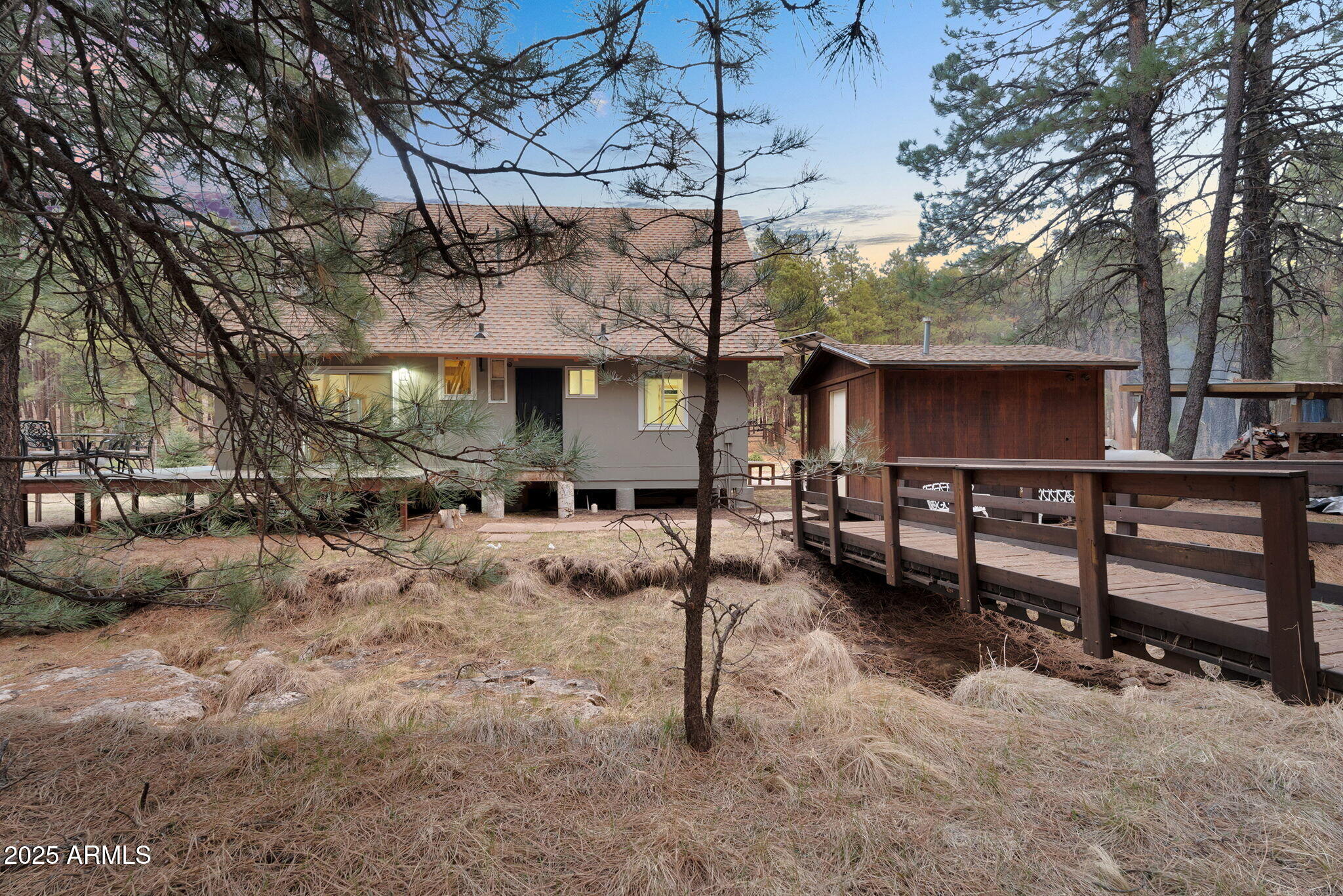 5348 Forest Service 701 Road Happy Jack, AZ 86024 - Photo 49 of 59 a view of a house with a yard covered in snow