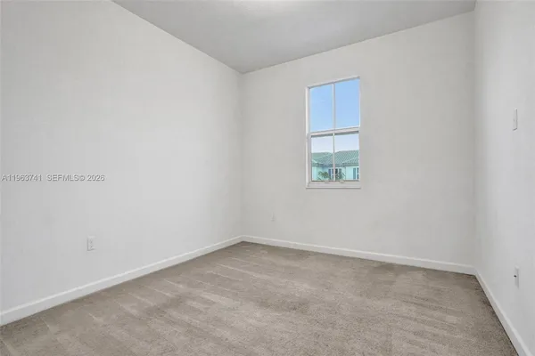 an empty room with a window