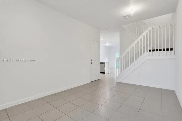 a view of an entryway with stairs