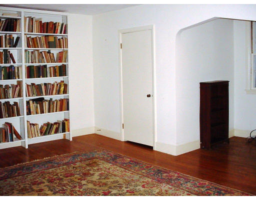 91 Grant Street Lexington, MA 02420 - Photo 4 of 8 a view of a book shelf with wooden floor