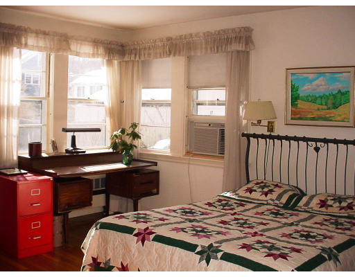 91 Grant Street Lexington, MA 02420 - Photo 8 of 8 a bedroom with a bed and a window