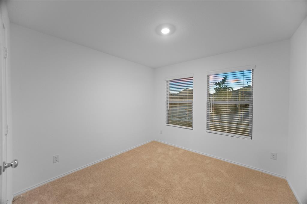 6436 Auburn Dl Road Pilot Point, TX 76258 - Photo 19 of 22 an empty room with a window