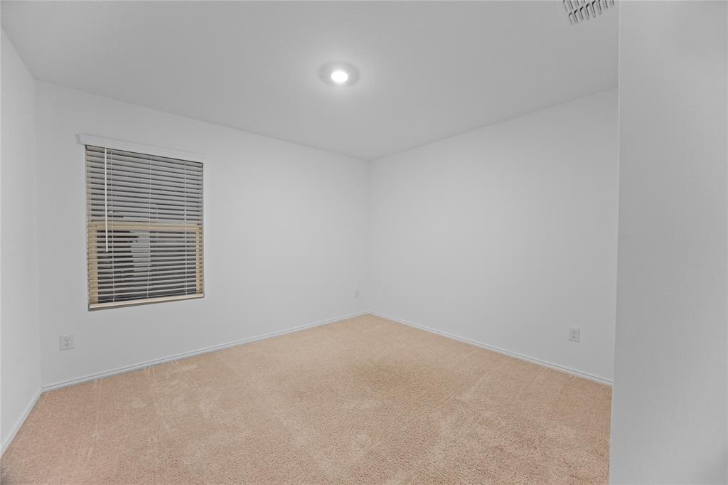 6436 Auburn Dl Road Pilot Point, TX 76258 - Photo 20 of 22 an empty room with a window