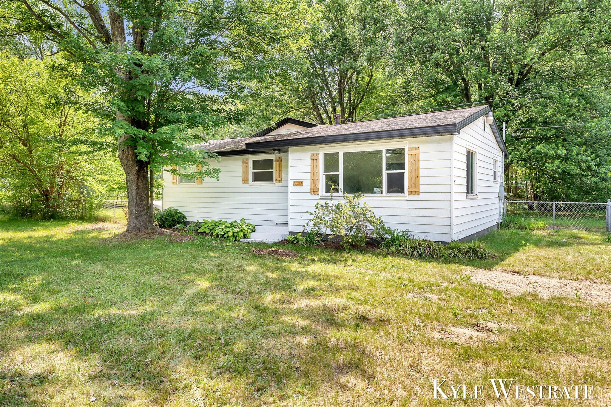 7219 South Maple Island Road Nunica, MI 49448 - Photo 2 of 30 03-KYL00447