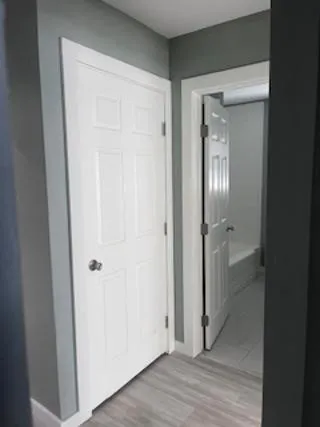 a view of a livingroom from a hallway