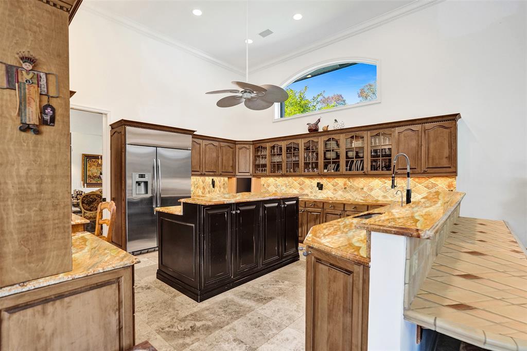 11720 Northwest 9th Street Plantation, FL 33325 - Photo 14 of 39 a kitchen with stainless steel appliances granite countertop a stove and a wooden cabinets