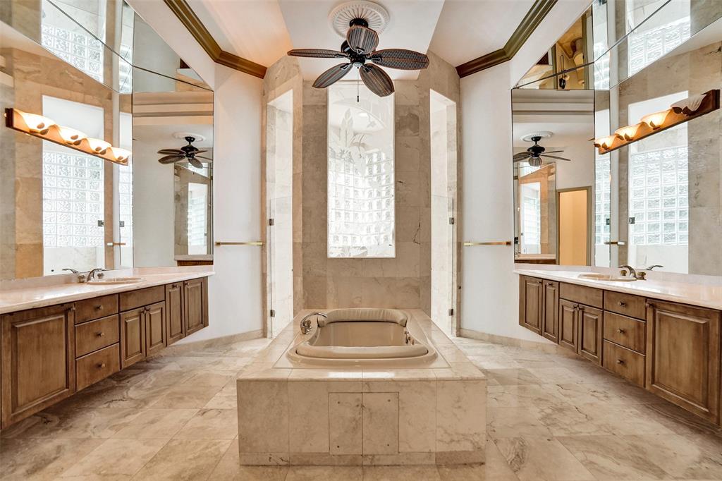 11720 Northwest 9th Street Plantation, FL 33325 - Photo 17 of 39 a spacious bathroom with a tub sink shower and mirror