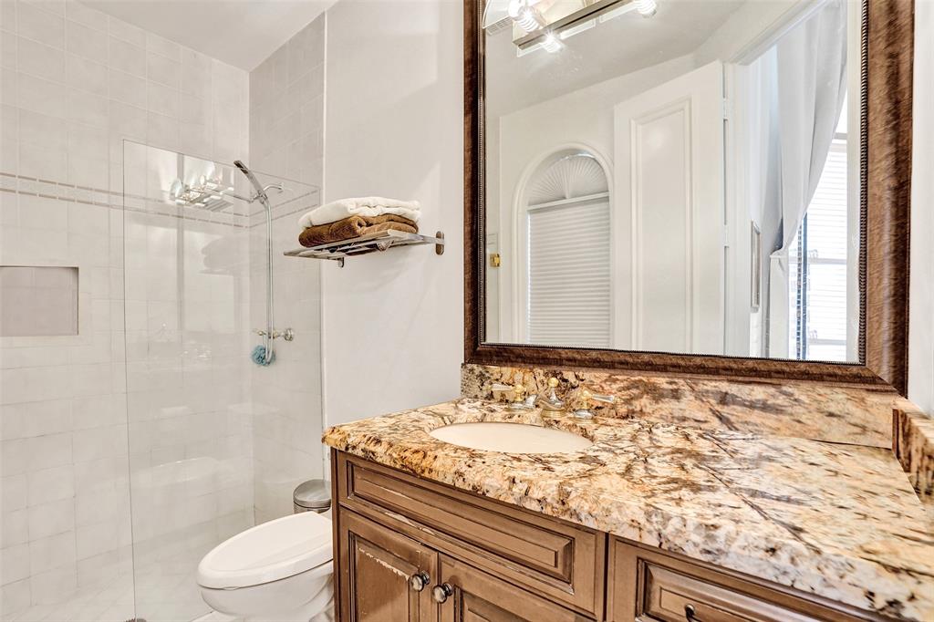 11720 Northwest 9th Street Plantation, FL 33325 - Photo 22 of 39 a bathroom with a granite countertop sink a toilet and shower