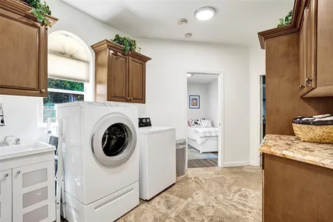 a view of a kitchen and utility room