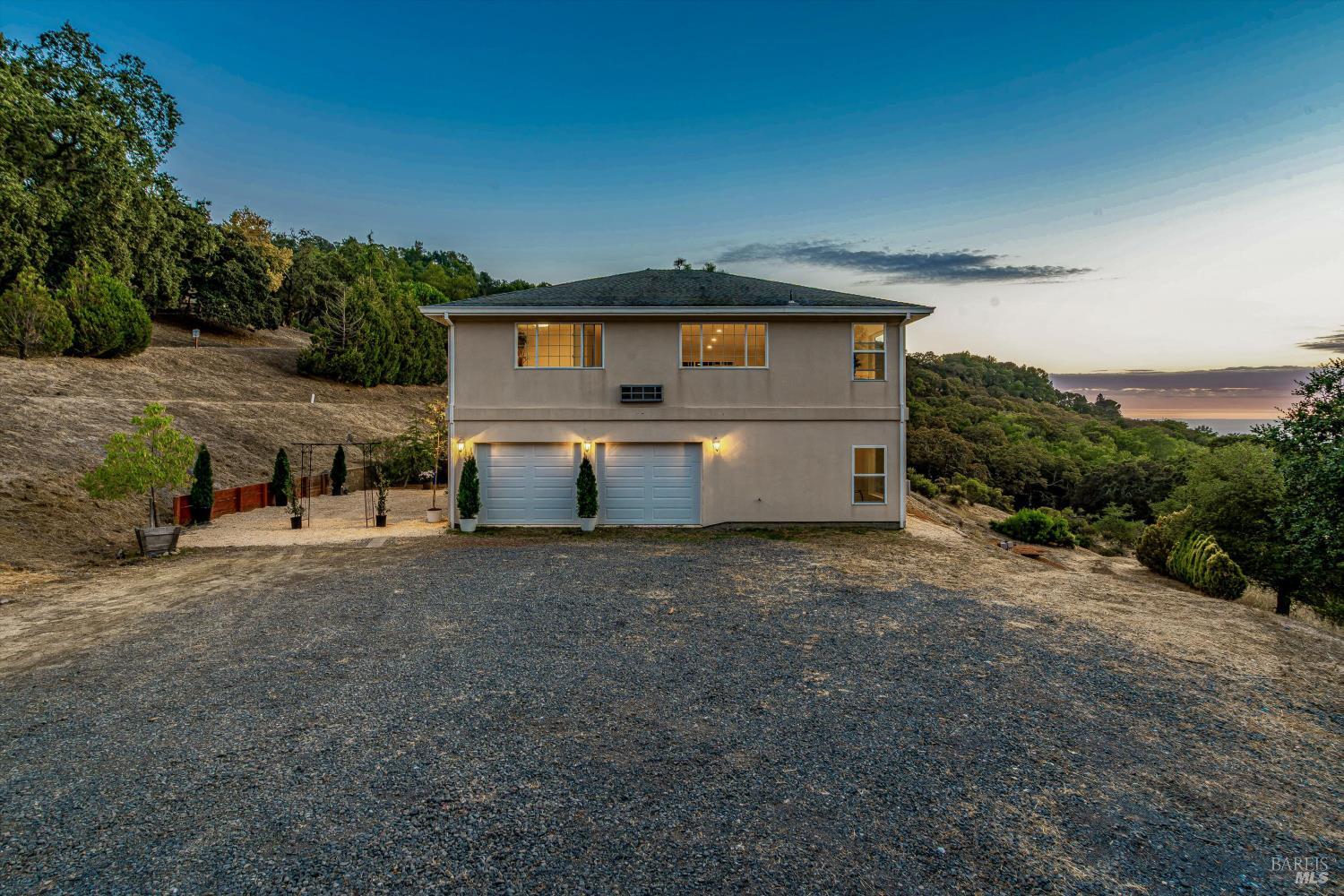 6001 Lichau Road Penngrove, CA 94951 - Photo 14 of 86 a front view of a house with a yard