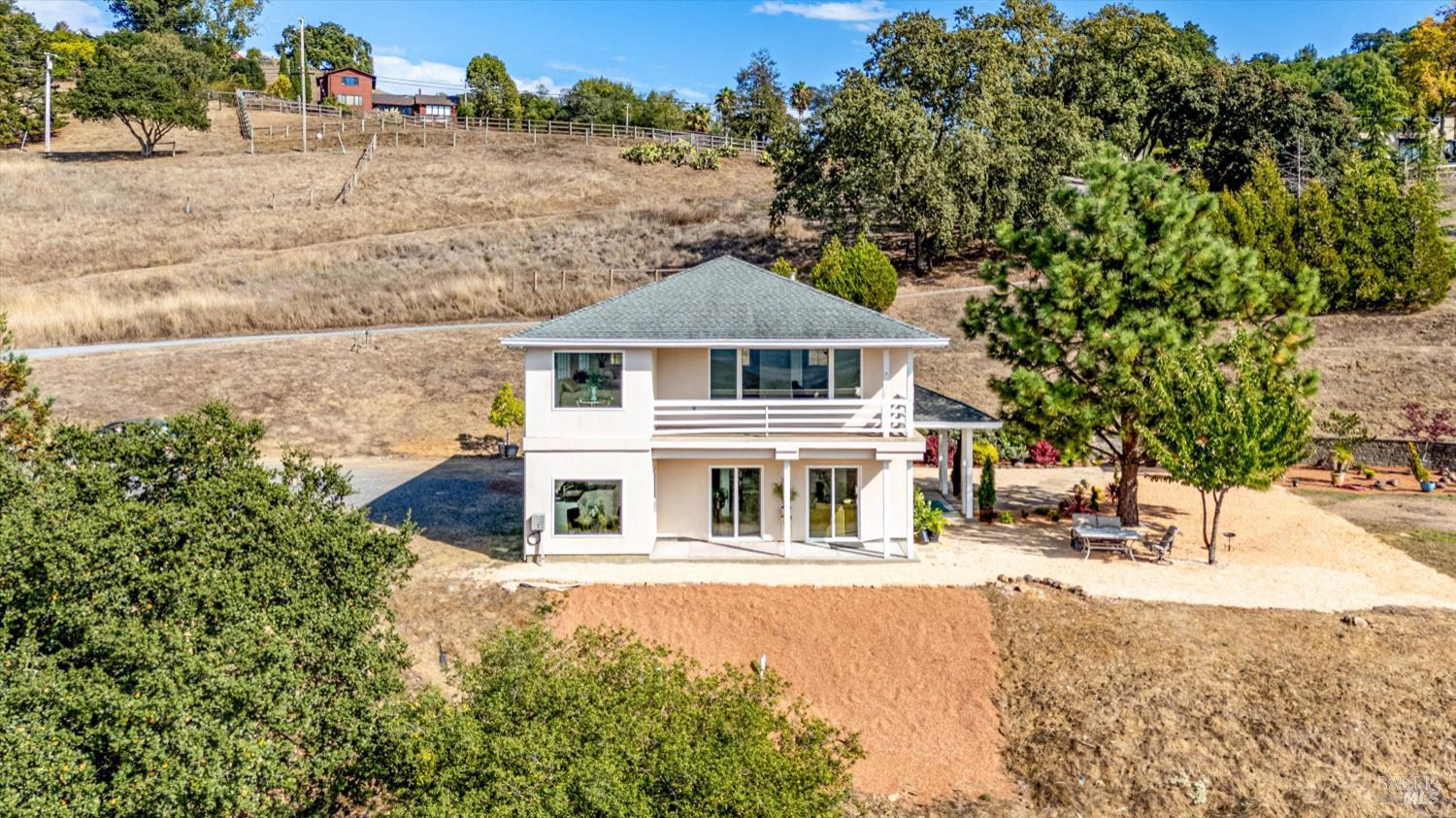 6001 Lichau Road Penngrove, CA 94951 - Photo 3 of 86 a front view of a house with a yard