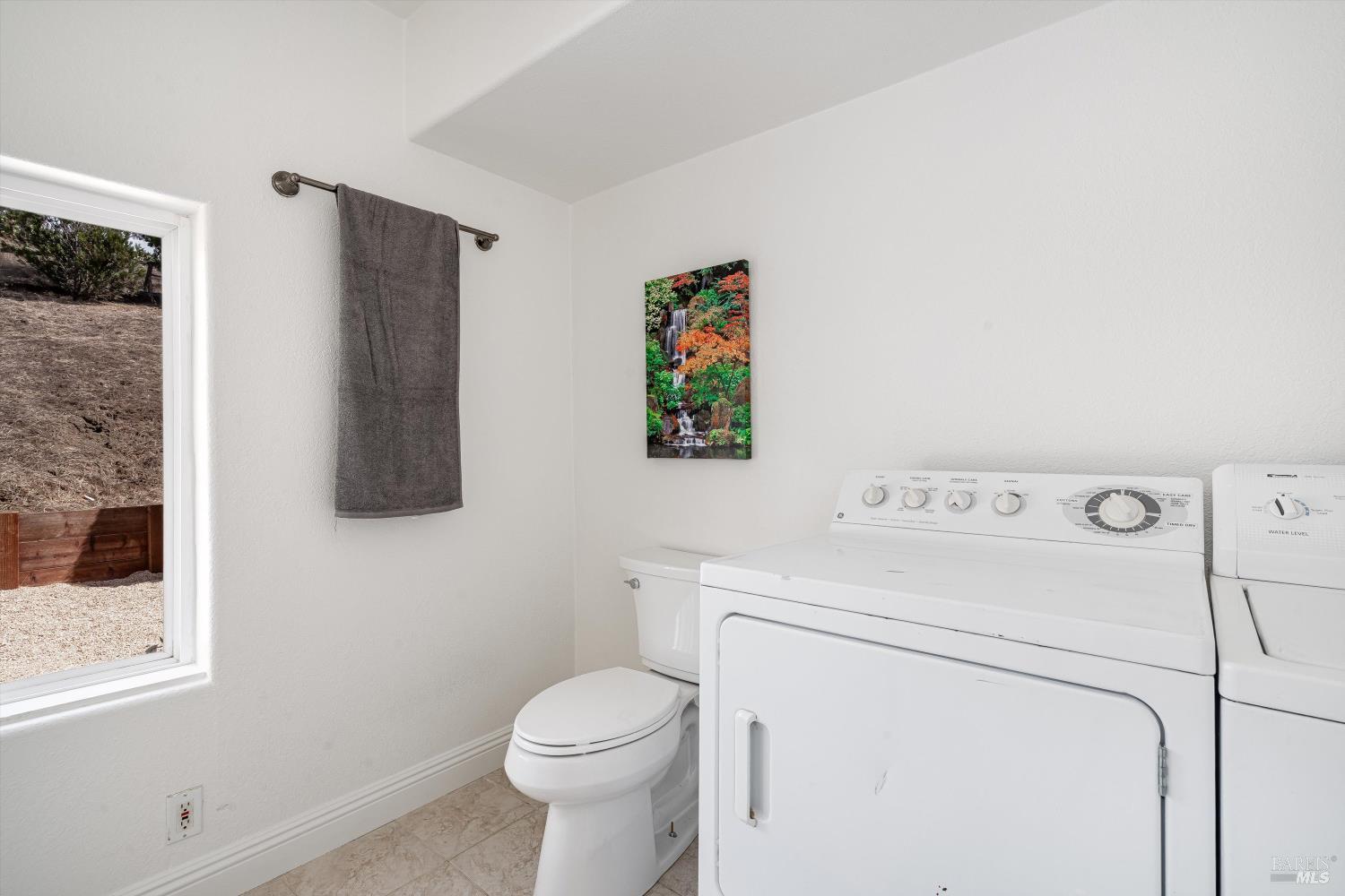 6001 Lichau Road Penngrove, CA 94951 - Photo 38 of 86 a view of bathroom with a toilet and a sink