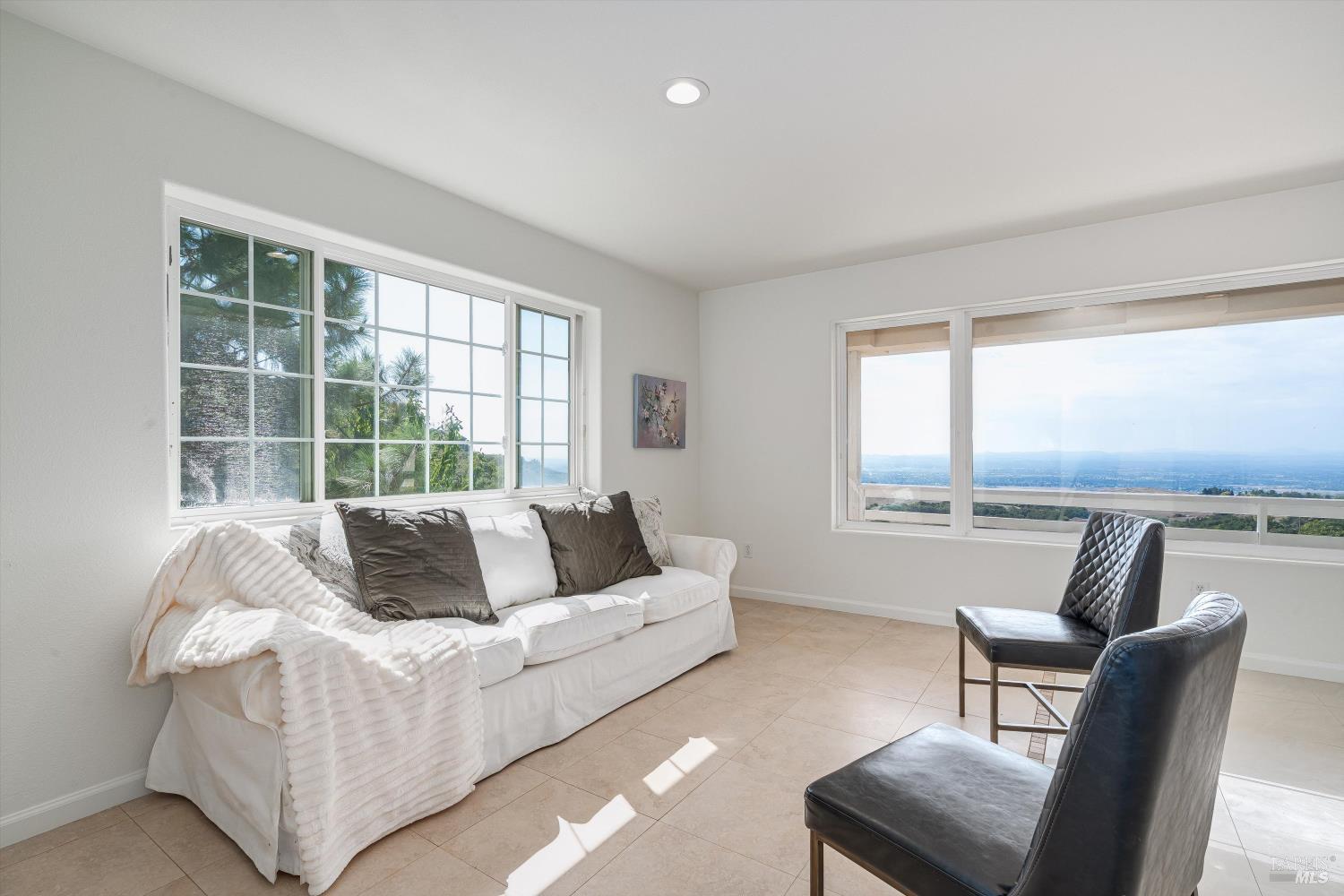 6001 Lichau Road Penngrove, CA 94951 - Photo 47 of 86 a living room with furniture and floor to ceiling window