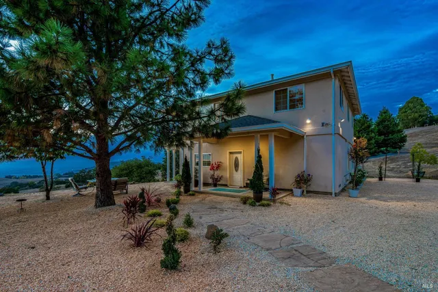 a view of a house with a patio