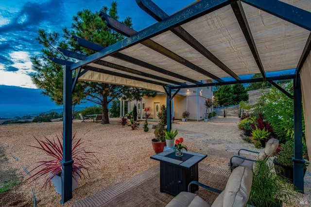 a view of a building with a yard