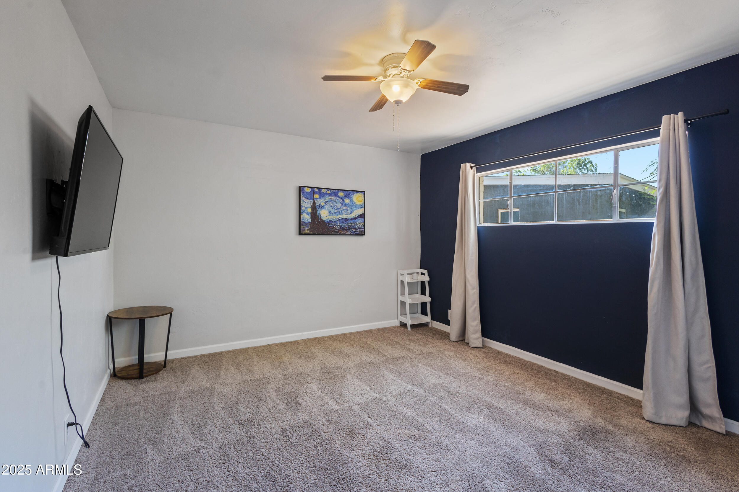 4536 North 18th Drive Phoenix, AZ 85015 - Photo 19 of 29 a view of an empty room with a window