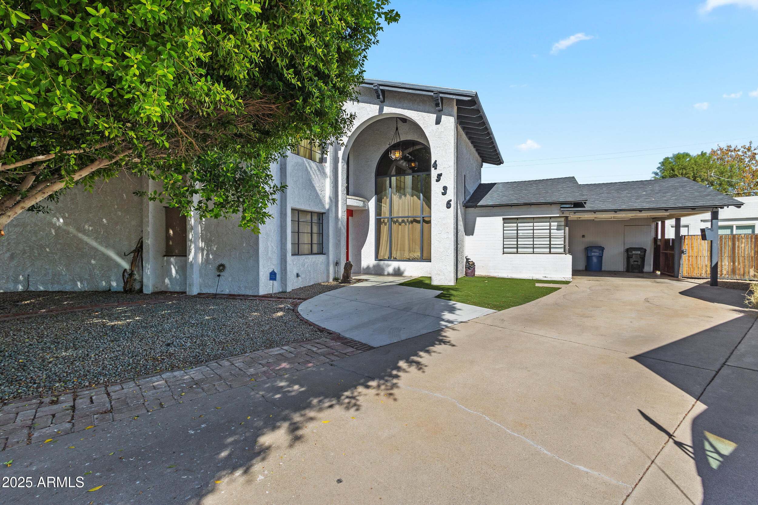 4536 North 18th Drive Phoenix, AZ 85015 - Photo 5 of 29 a front view of a house with a yard