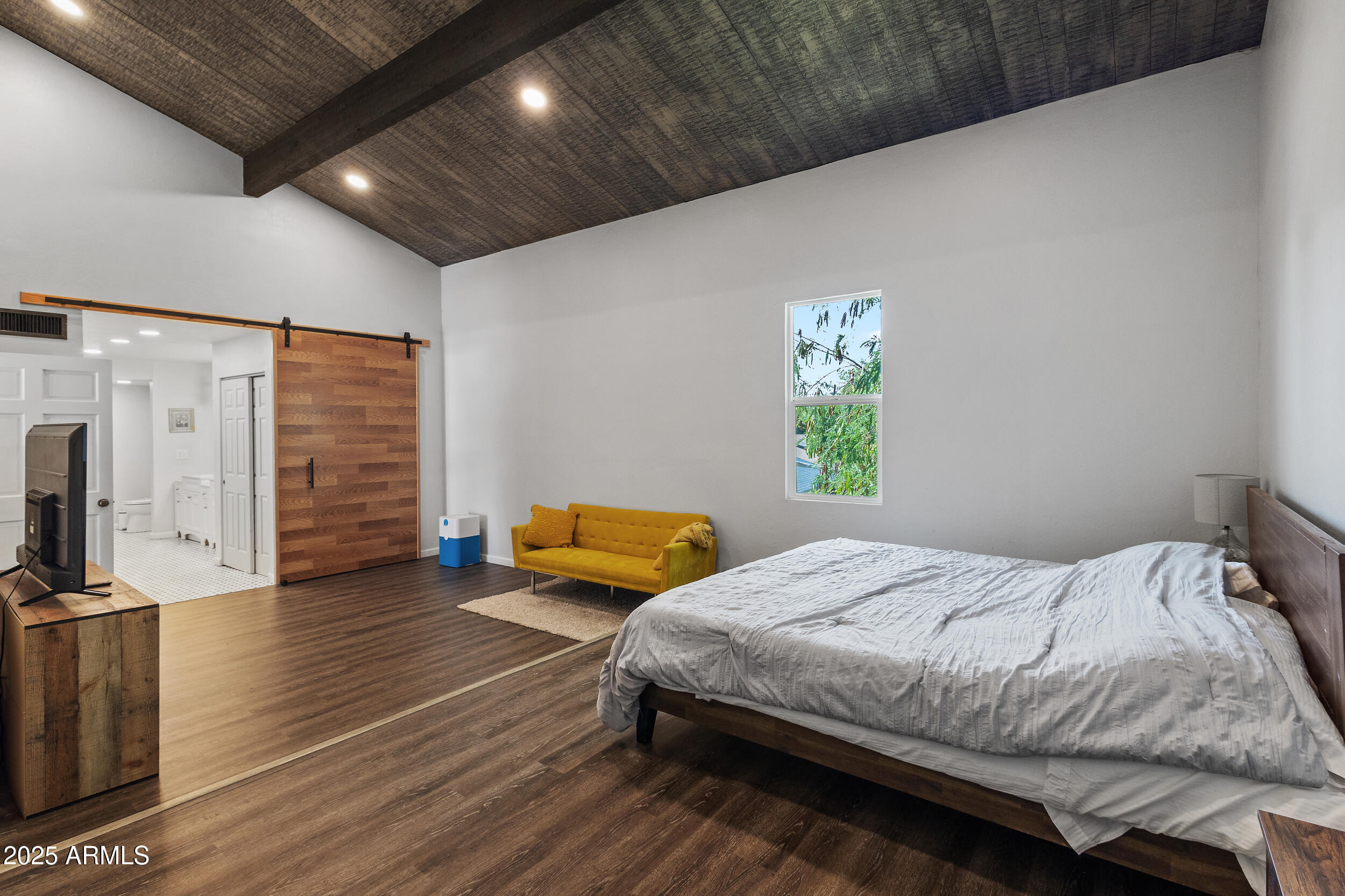 4536 North 18th Drive Phoenix, AZ 85015 - Photo 9 of 29 a bedroom with a bed and a couch