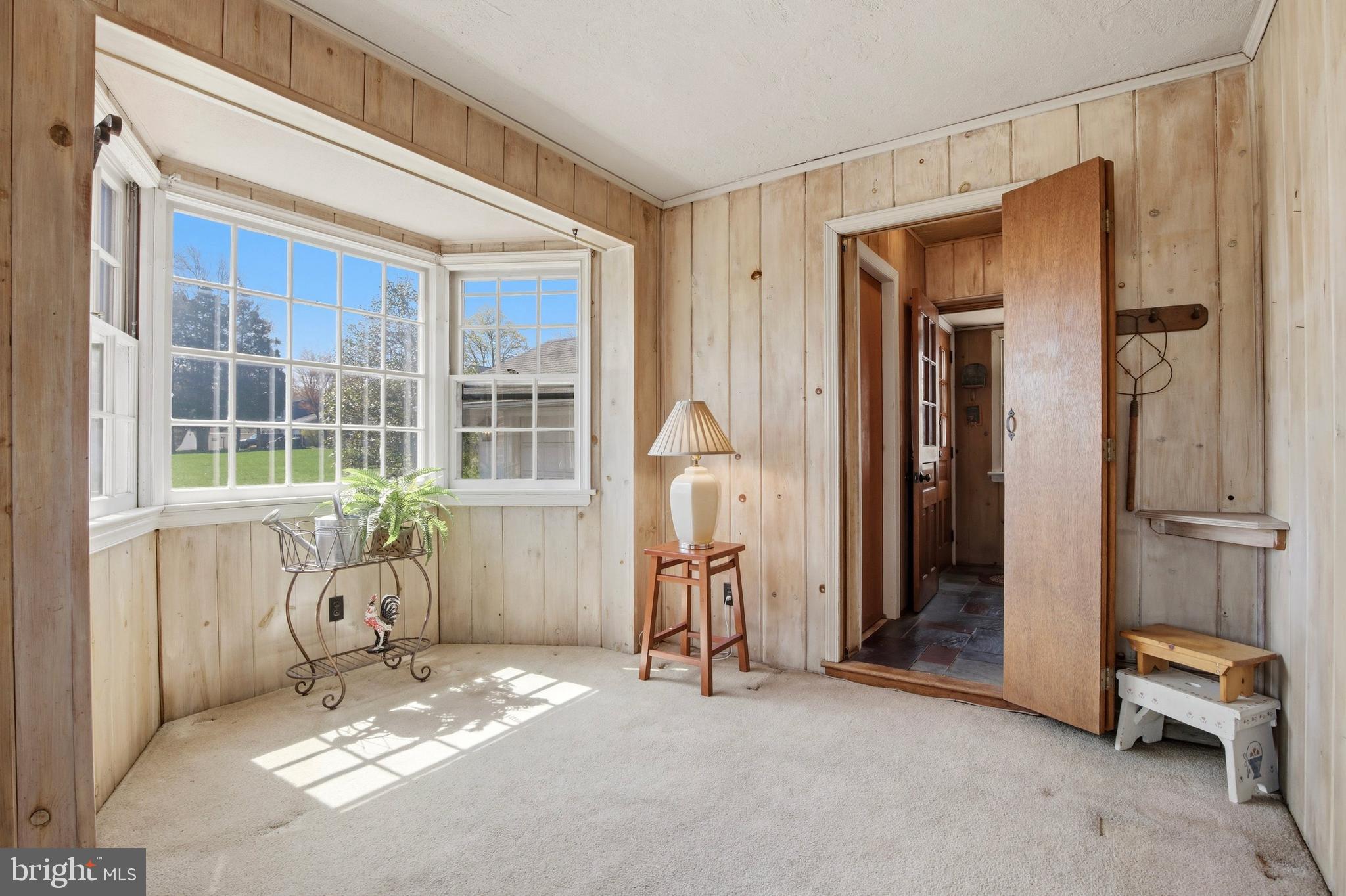 2240 Pioneer Road Hatboro, PA 19040 - Photo 9 of 28 Den with Hallway to Powder Room & Coat Closet