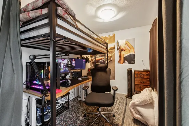 a store room with lots of different colored cloths