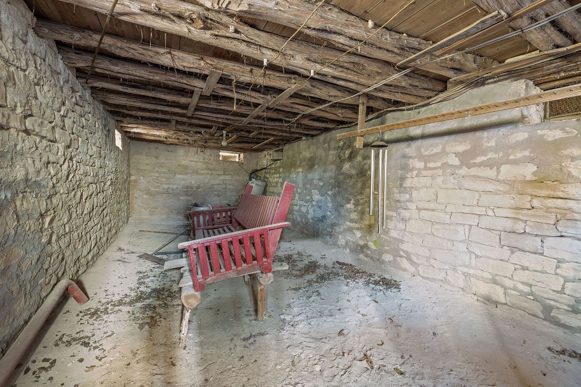 8409 Appaloosa Run Austin, TX 78737 - Photo 12 of 40 a outdoor space with a wooden bench