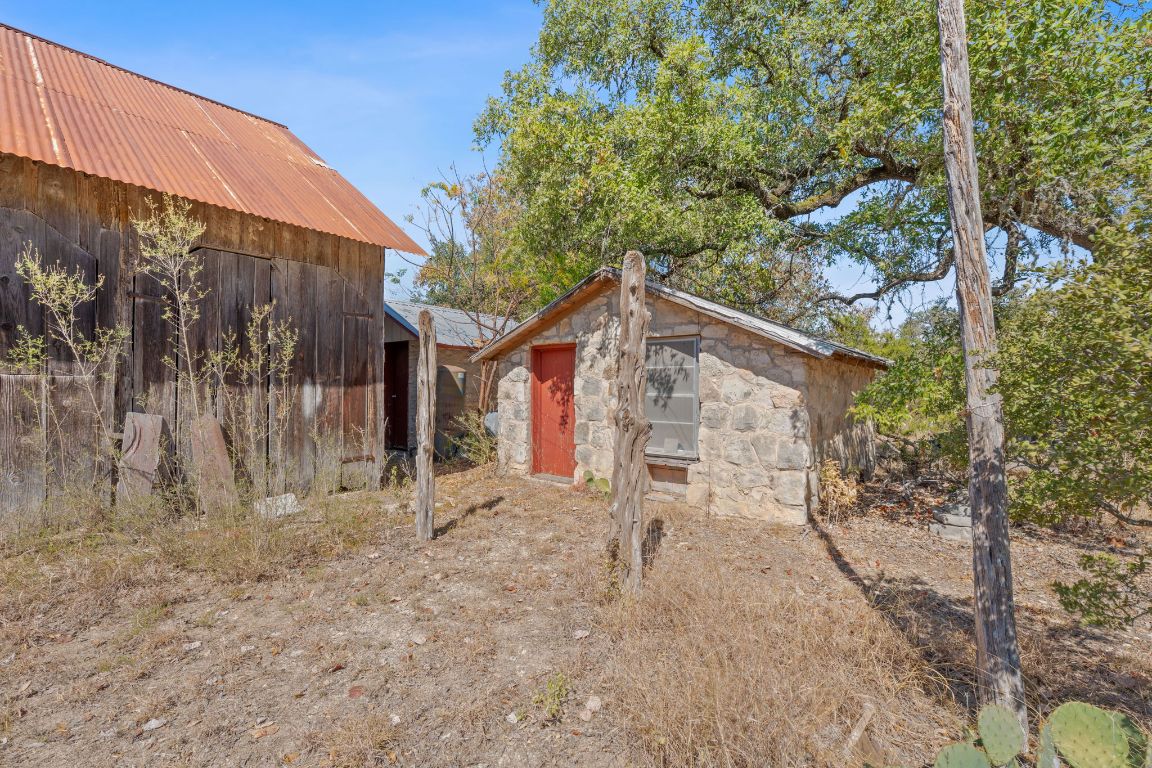 8409 Appaloosa Run Austin, TX 78737 - Photo 15 of 40 a view of a house with a yard
