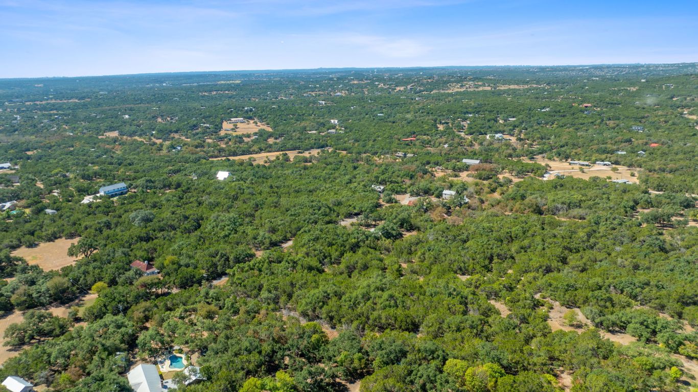 8409 Appaloosa Run Austin, TX 78737 - Photo 20 of 40 a view of a field with an ocean