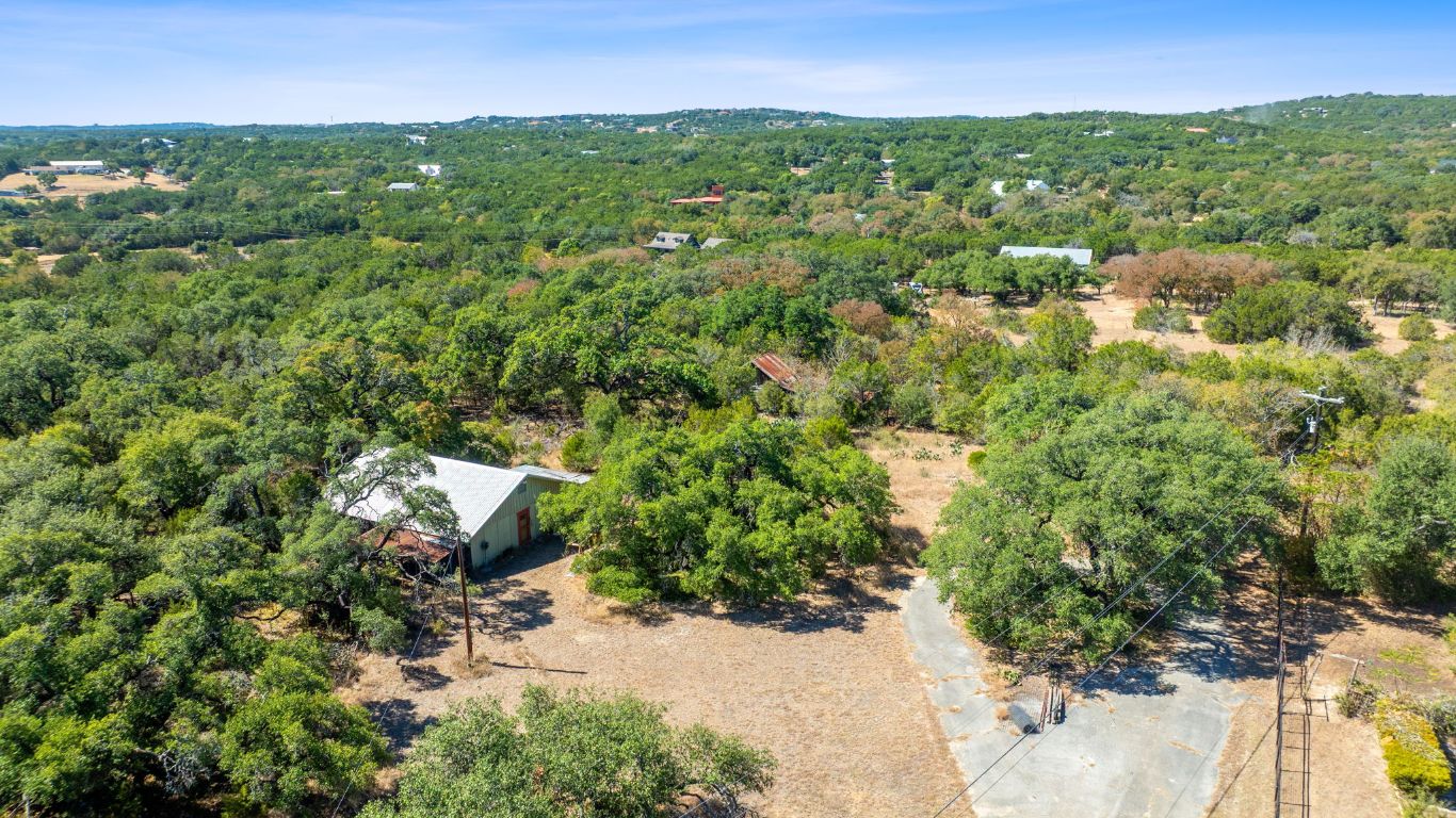 8409 Appaloosa Run Austin, TX 78737 - Photo 23 of 40 a view of a city with lush green forest