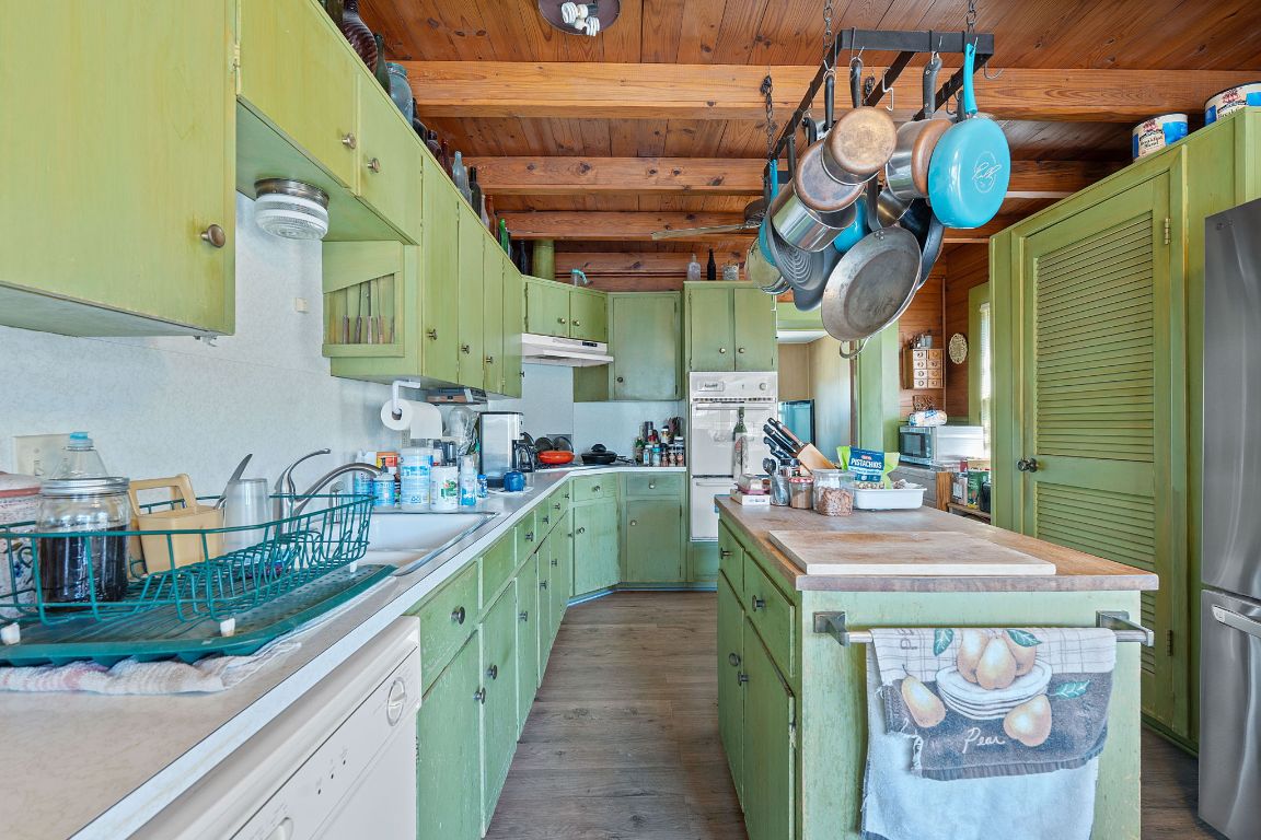 8409 Appaloosa Run Austin, TX 78737 - Photo 6 of 40 a view of a kitchen with furniture and a kitchen
