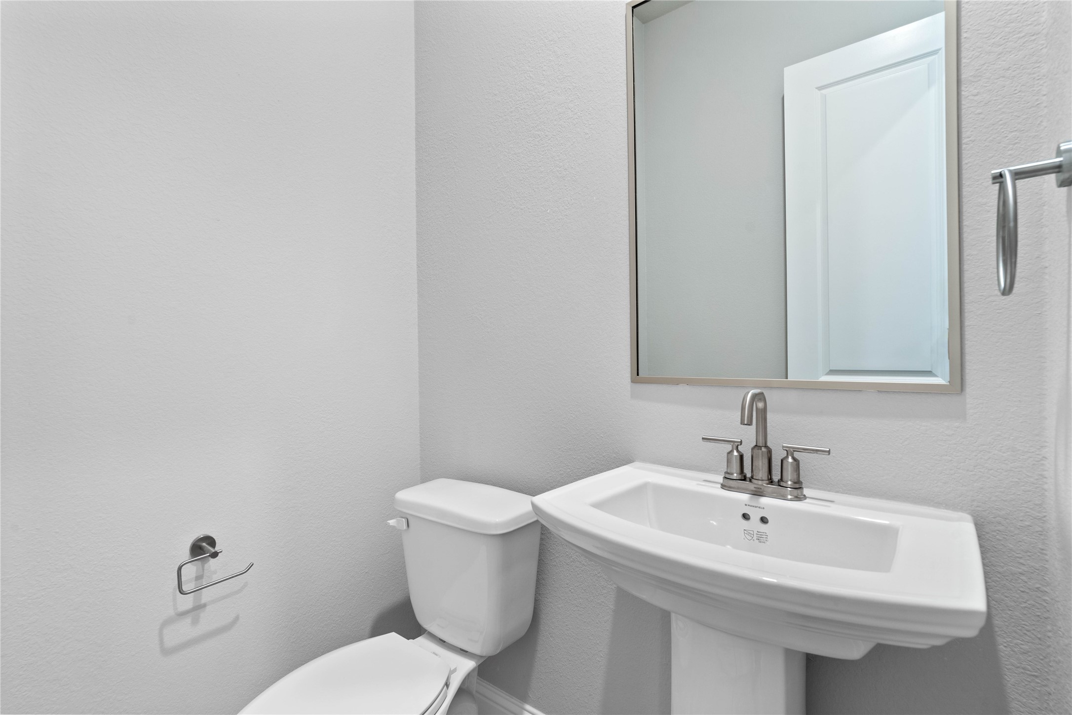 17020 Sweet Iris Court Conroe, TX 77302 - Photo 16 of 50 The powder bath features a stylish vanity and a clean, modern design.