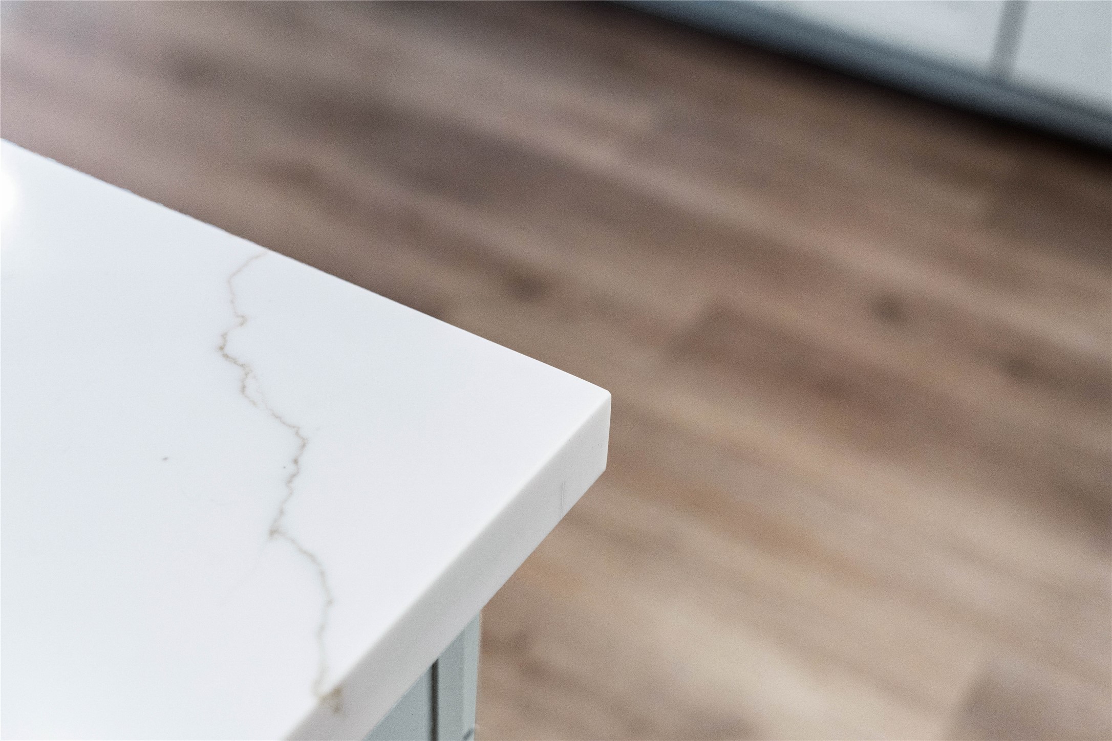 17020 Sweet Iris Court Conroe, TX 77302 - Photo 20 of 50 This striking quartz countertop combines the elegant, deep-veined look of natural stone with a highly durable, non-porous surface that is exceptionally resistant to scratches, stains, and daily wear.