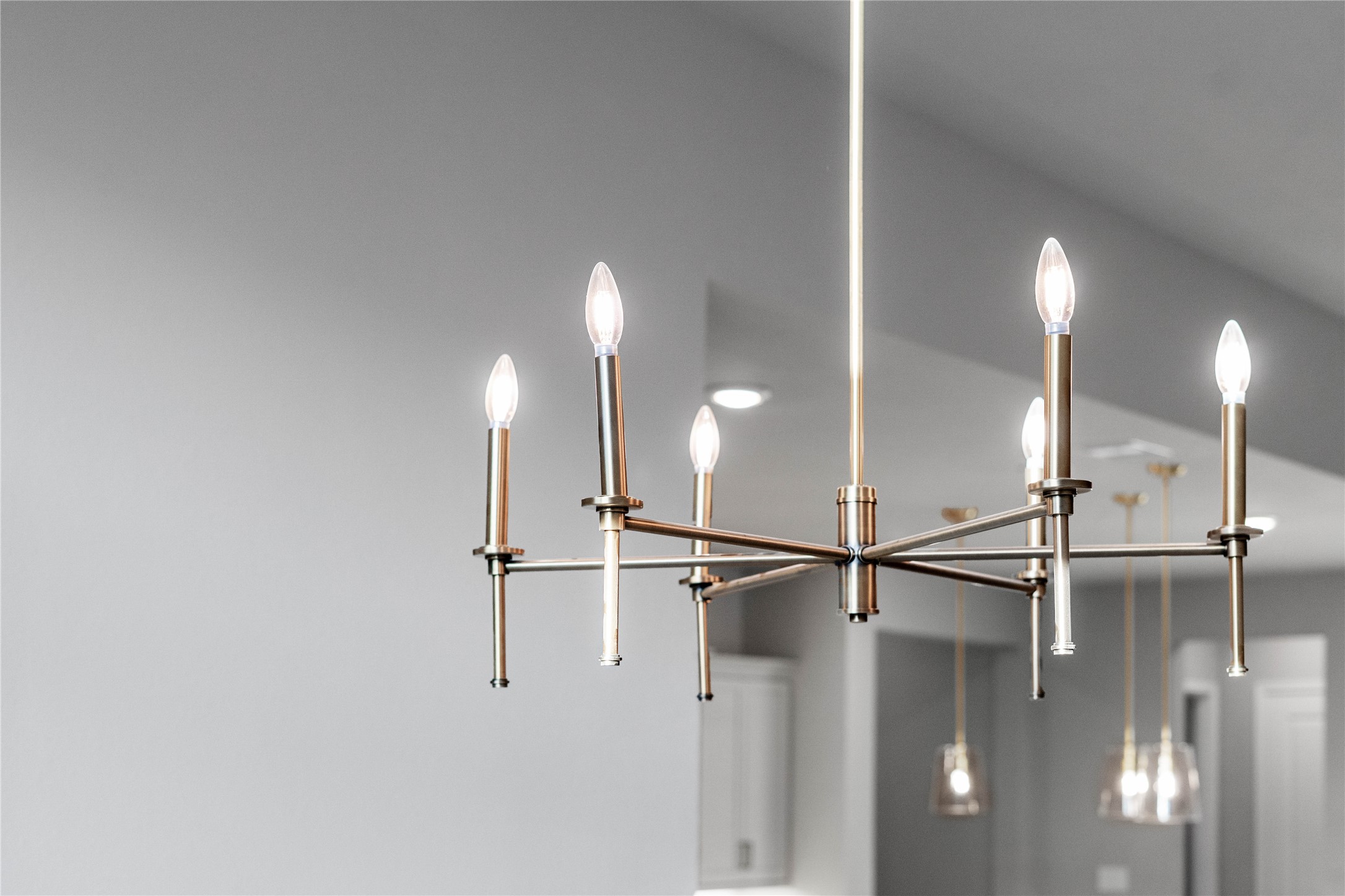 17020 Sweet Iris Court Conroe, TX 77302 - Photo 26 of 50 This chandelier is a member of the Elara Collection, featuring a "new traditional" design that elegantly bridges the gap between classic and modern styles.