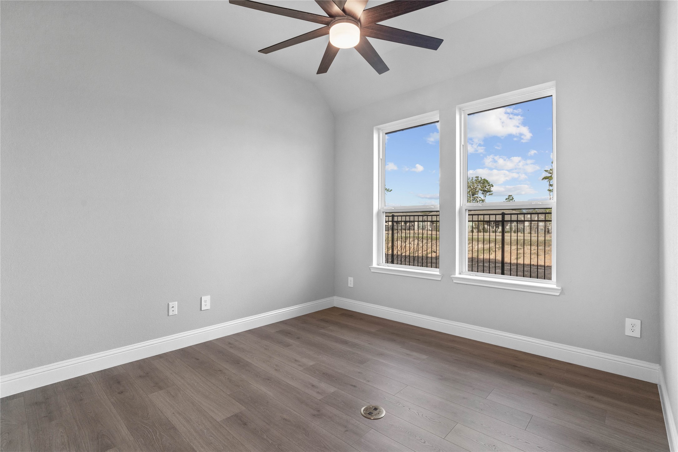 17020 Sweet Iris Court Conroe, TX 77302 - Photo 32 of 50 Perfect for entertaining is this amazing Game Room! This space would be a fabulous teen hangout or adult game room! Featuring laminate flooring, high sloped ceiling with ceiling fan, custom paint and large windows.