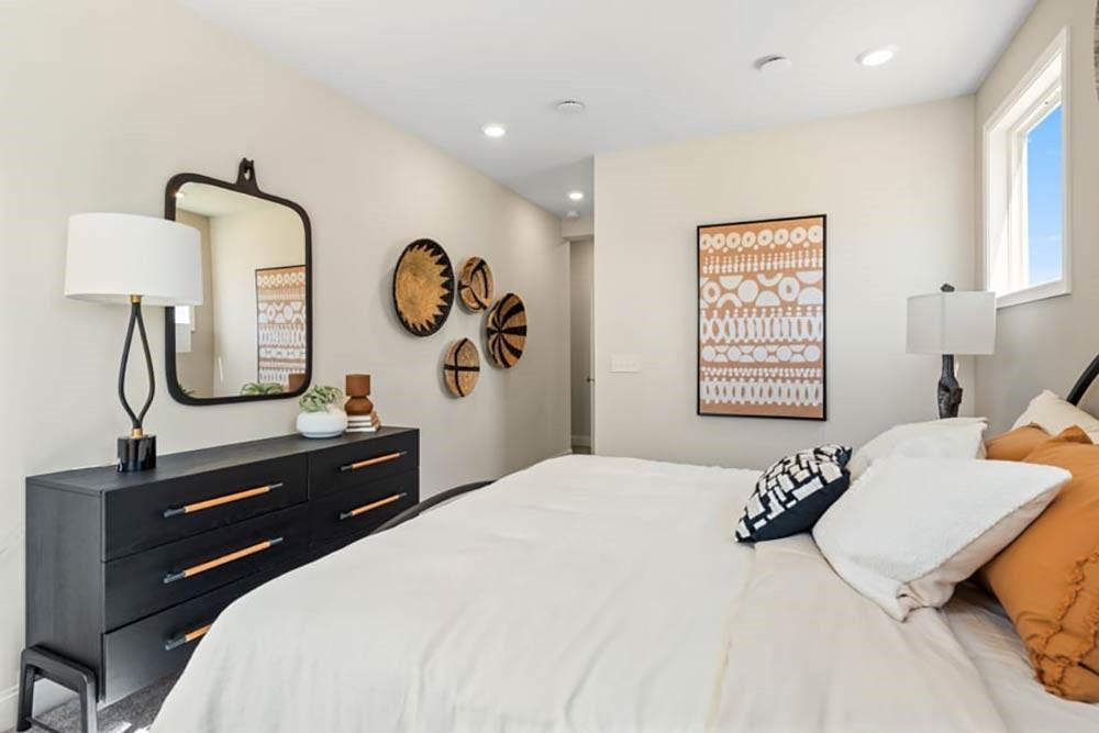 300 Meacham Court Dacula, GA 30019 - Photo 27 of 61 a bedroom with a bed and a table