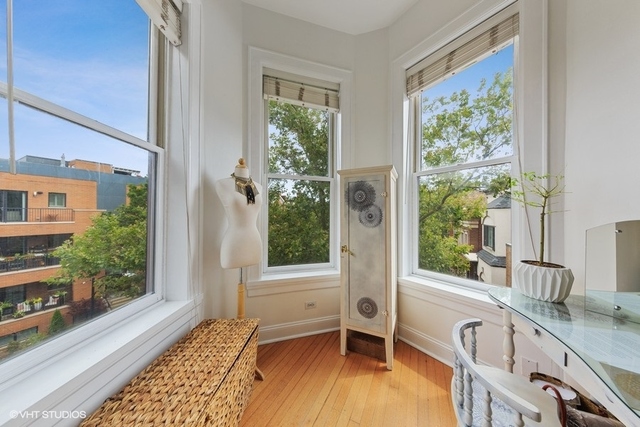 1049 West Altgeld Street, Unit 3A Chicago, IL 60614 - Photo 13 of 18 a view of a kitchen with a sink and a window