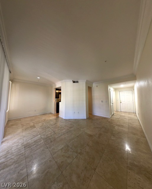 270 East Flamingo Road, Unit 336 Las Vegas, NV 89169 - Photo 11 of 11 This expansive living area offers an open floor plan, crown molding, and tiled flooring.