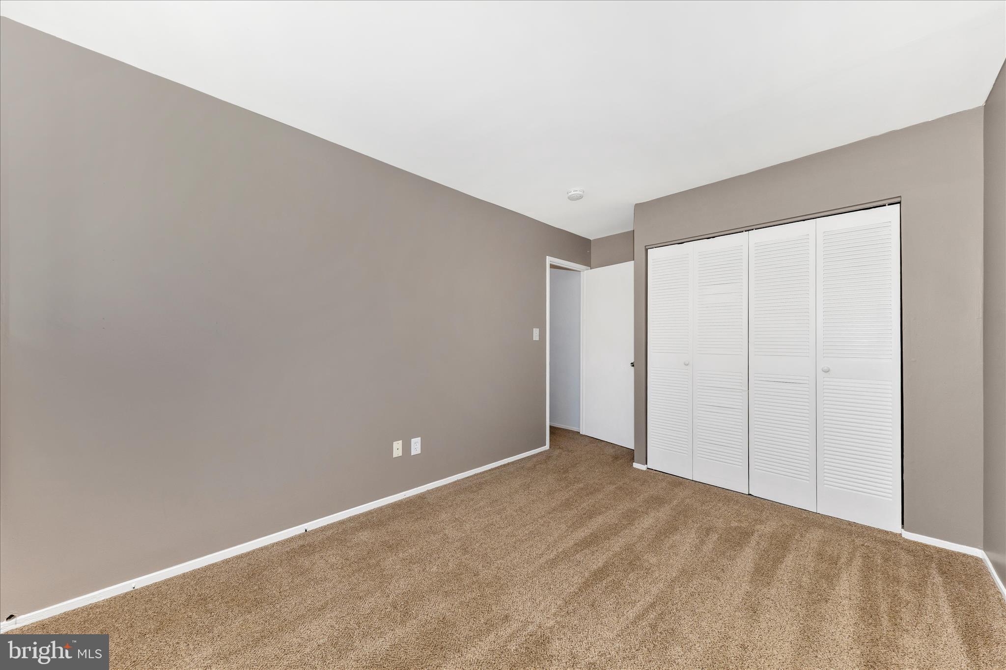 9989 Ridgeline Drive Montgomery Village, MD 20886 - Photo 17 of 26 a view of an empty room