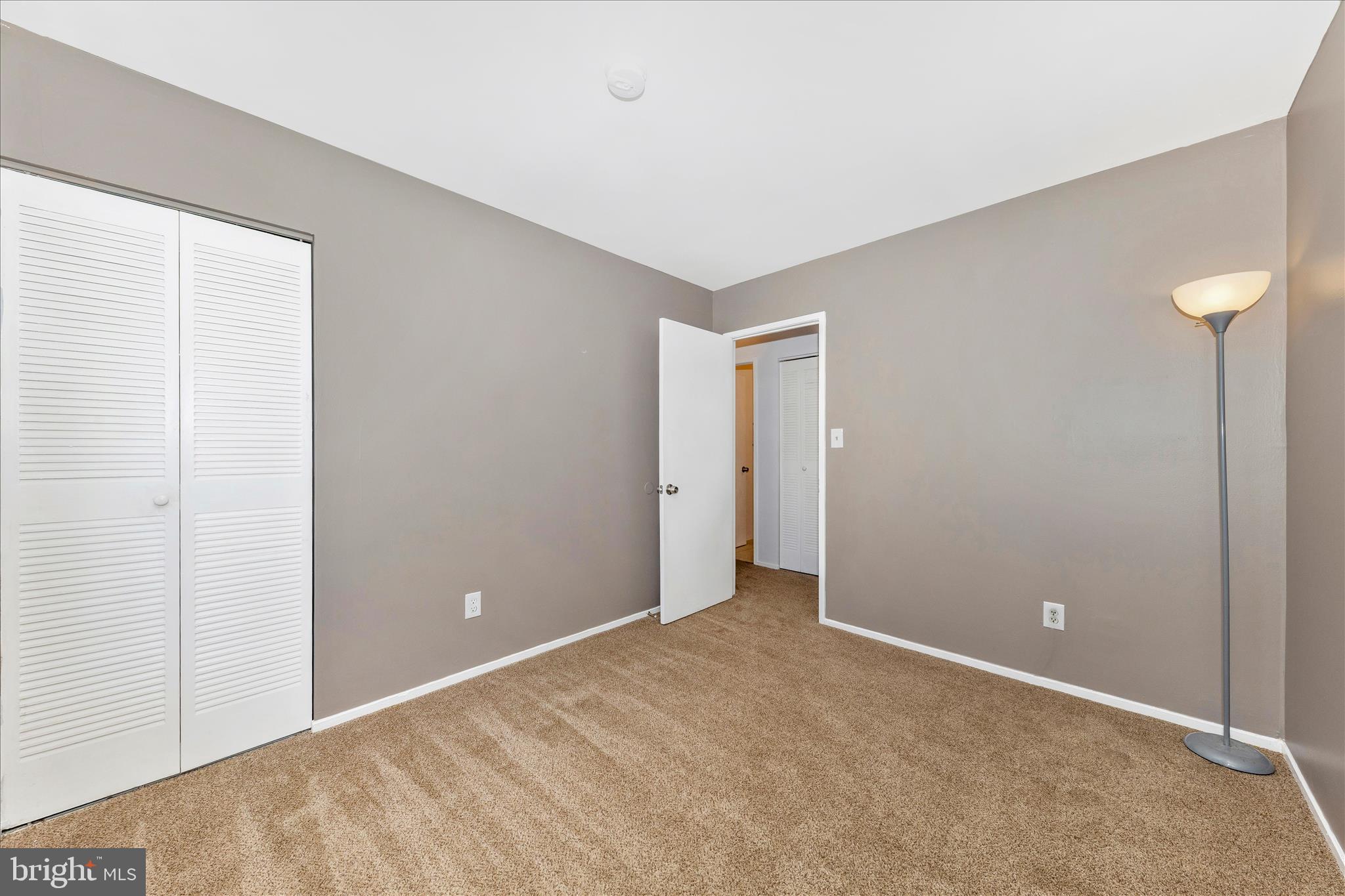 9989 Ridgeline Drive Montgomery Village, MD 20886 - Photo 19 of 26 a view of an empty room and window