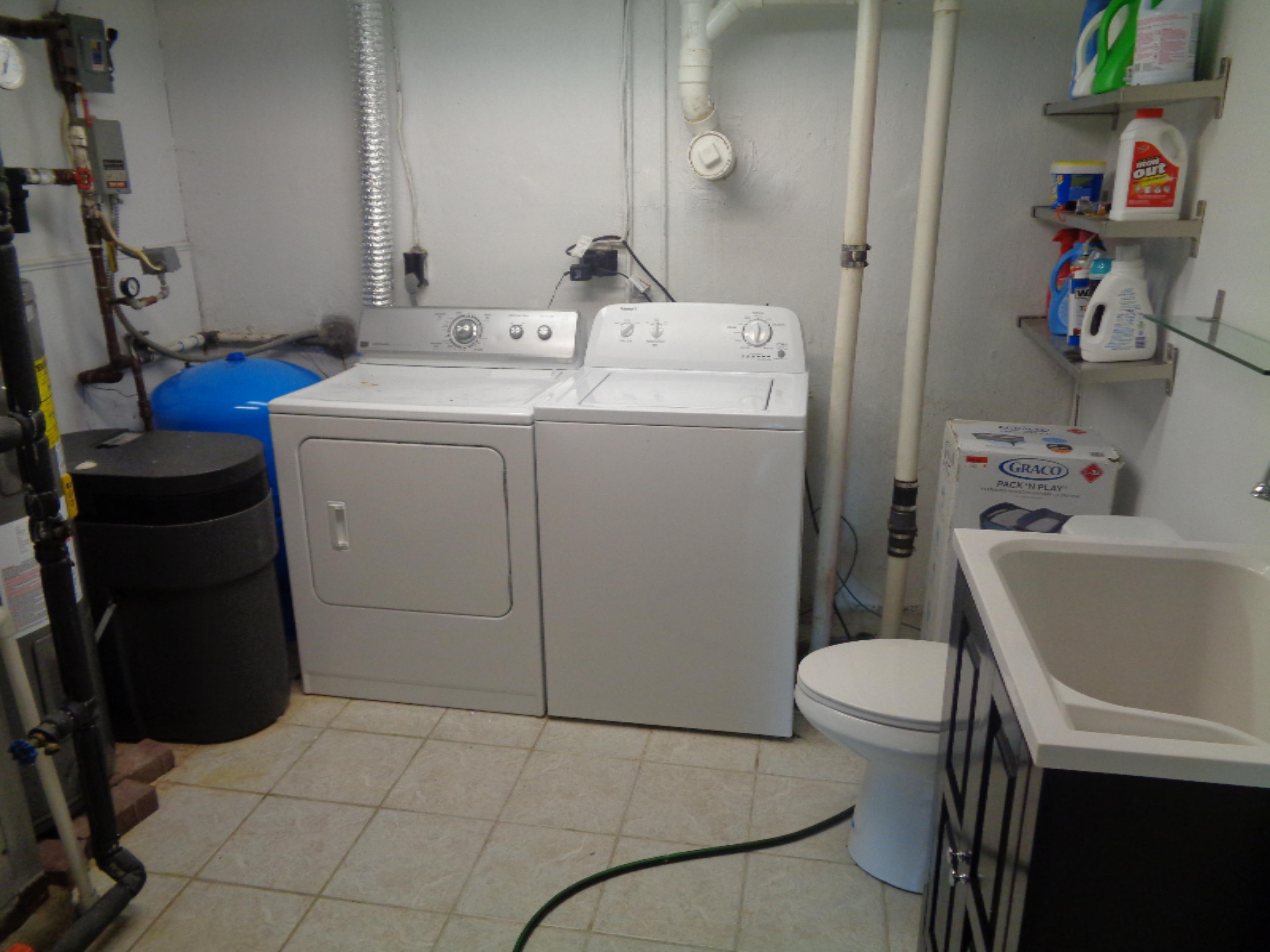 8755 Highland Road Watervliet, MI 49098 - Photo 12 of 34 Lower level Laundry and half bath