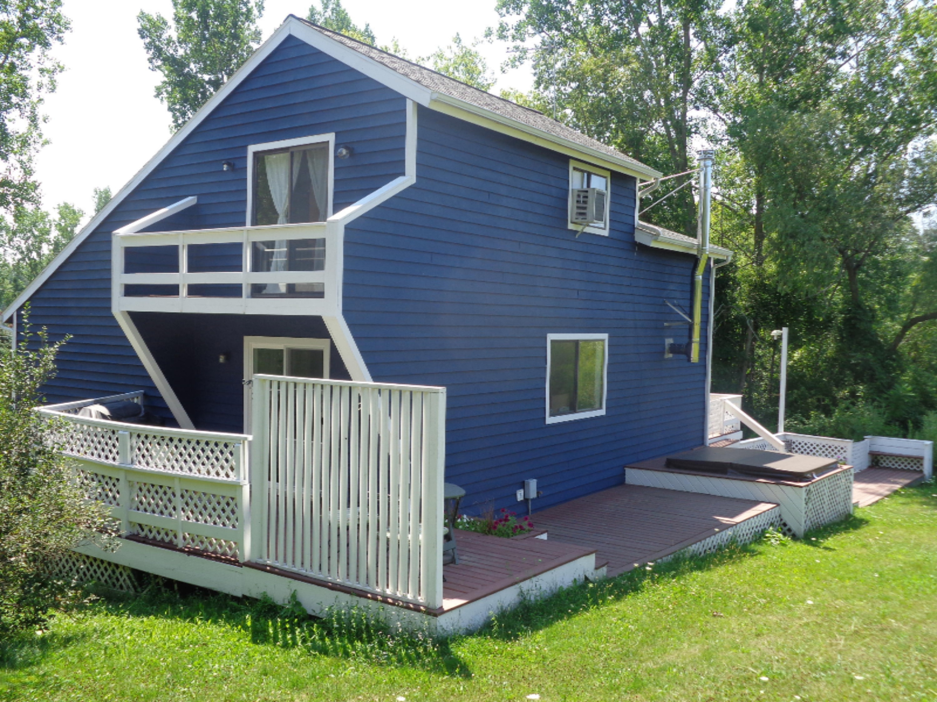 8755 Highland Road Watervliet, MI 49098 - Photo 3 of 34 Backyard/decks/hot tub