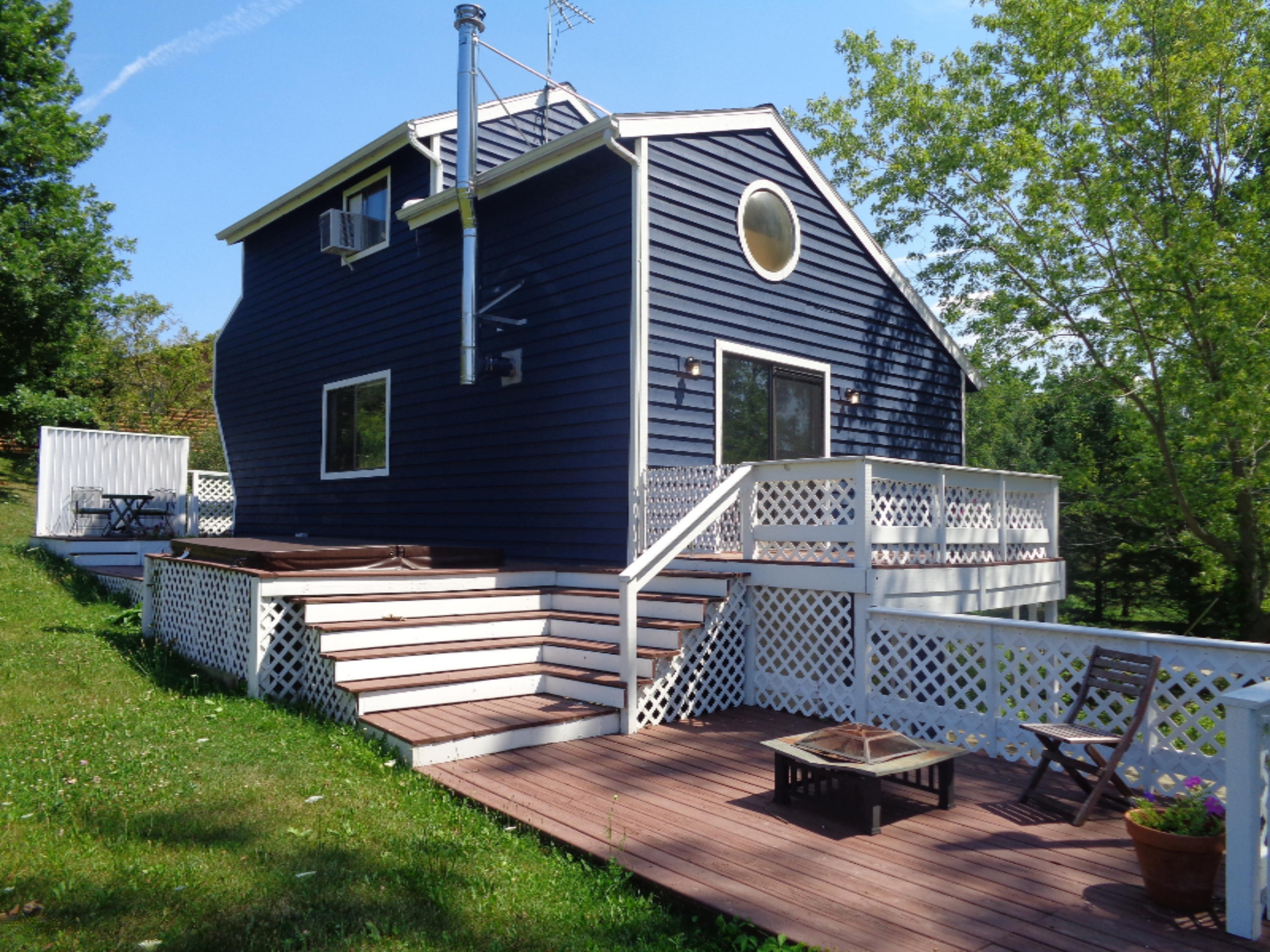 8755 Highland Road Watervliet, MI 49098 - Photo 5 of 34 Back Deck and Main level wrap around
