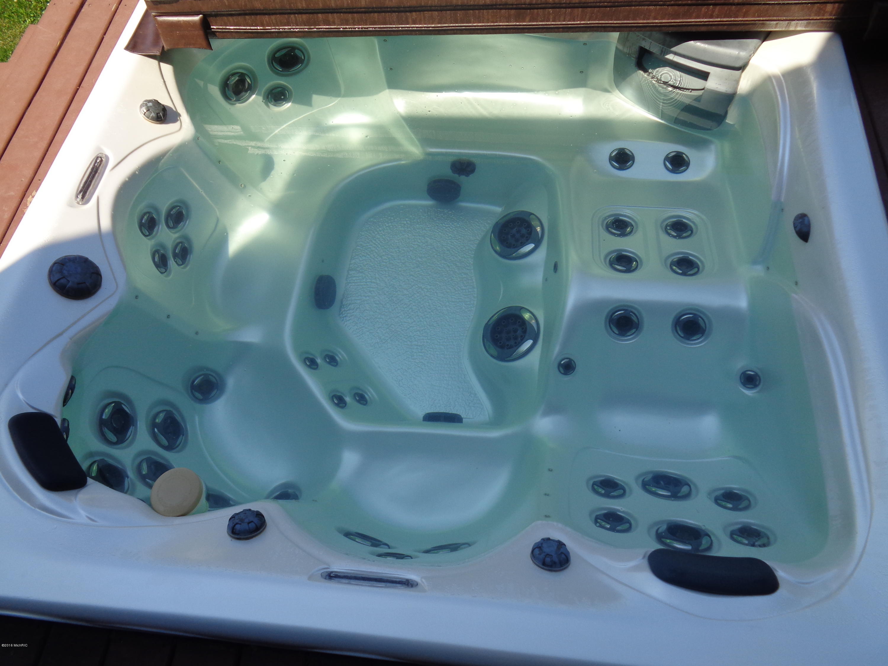 8755 Highland Road Watervliet, MI 49098 - Photo 8 of 34 8 person hot tub w/cover