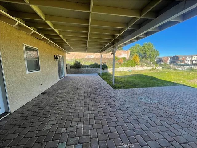 a view of a backyard of a house