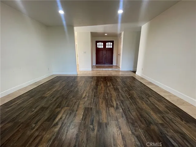 a view of an empty room and window