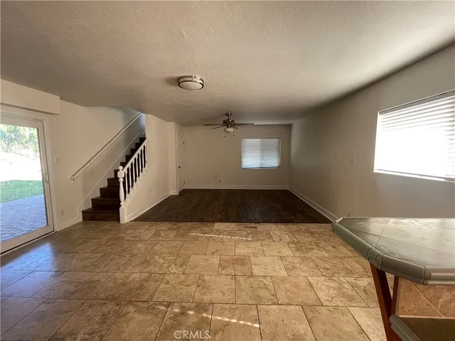 a view of a livingroom with a staircase