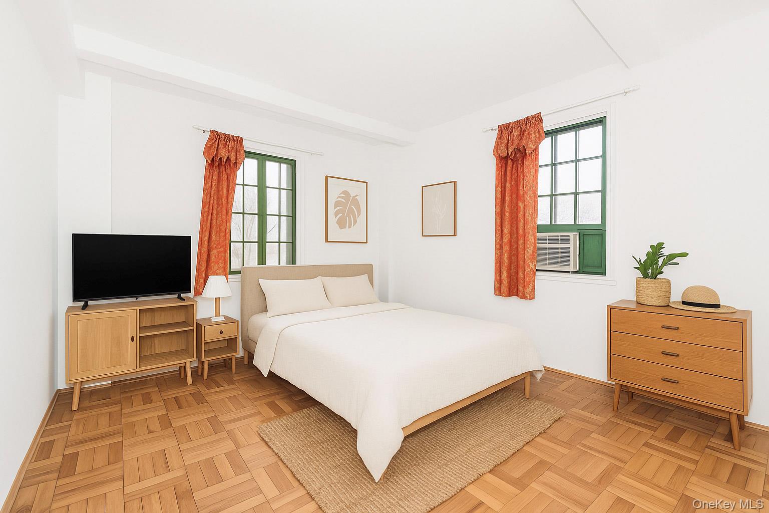 1540 Unionport Road, Unit 7F Bronx, NY 10462 - Photo 3 of 16 a bedroom with a bed and a flat screen tv